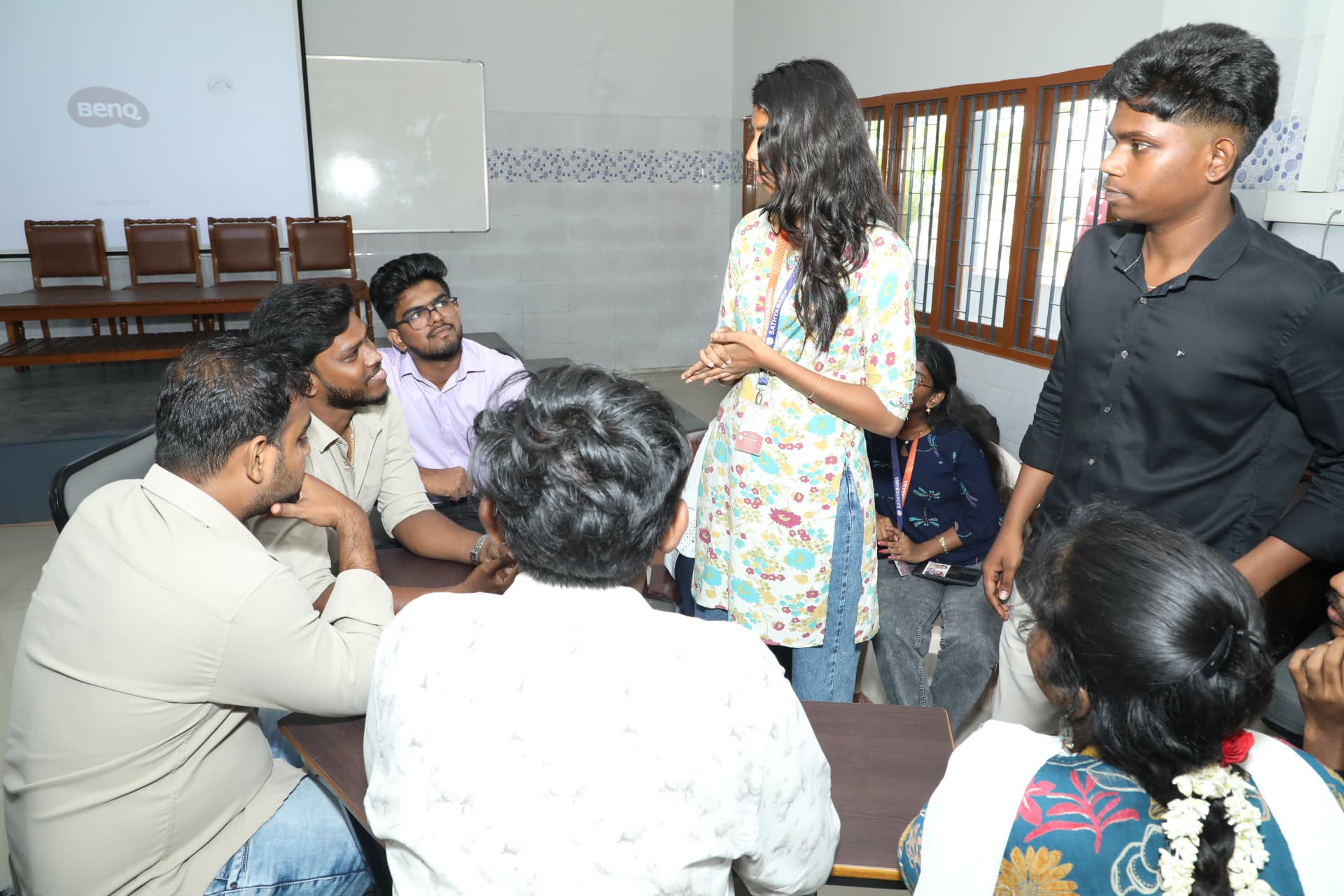 A student sharing an idea during a collaborative group activity