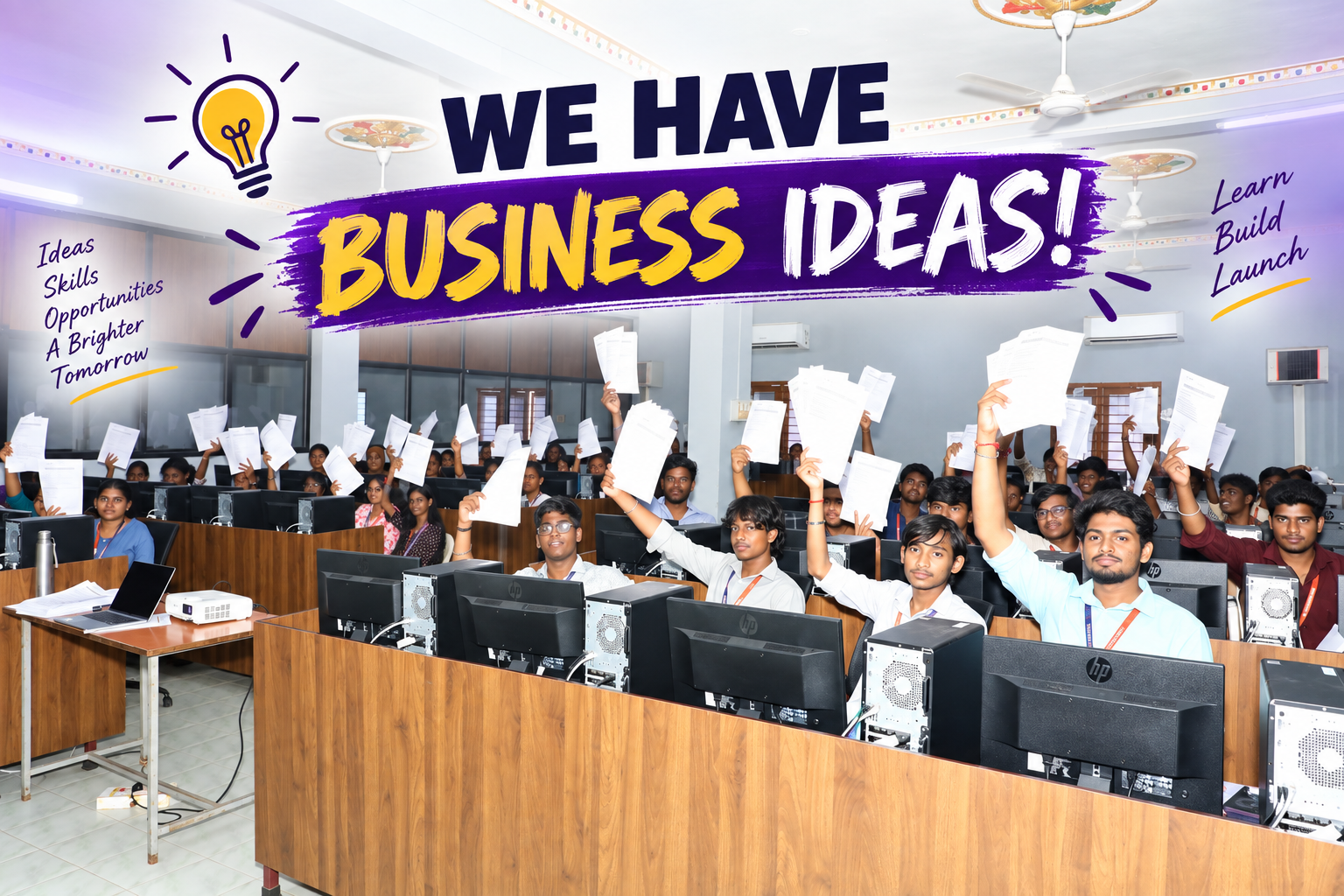 College students raising their business idea worksheets during a B2E campus program